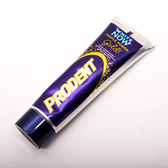 Afrika Twinkelen fiets Prodent White Now Triple Power Gold | TheBeautyMusthaves